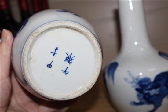 A pair of Chinese blue and white bottle vases tallest 22cm